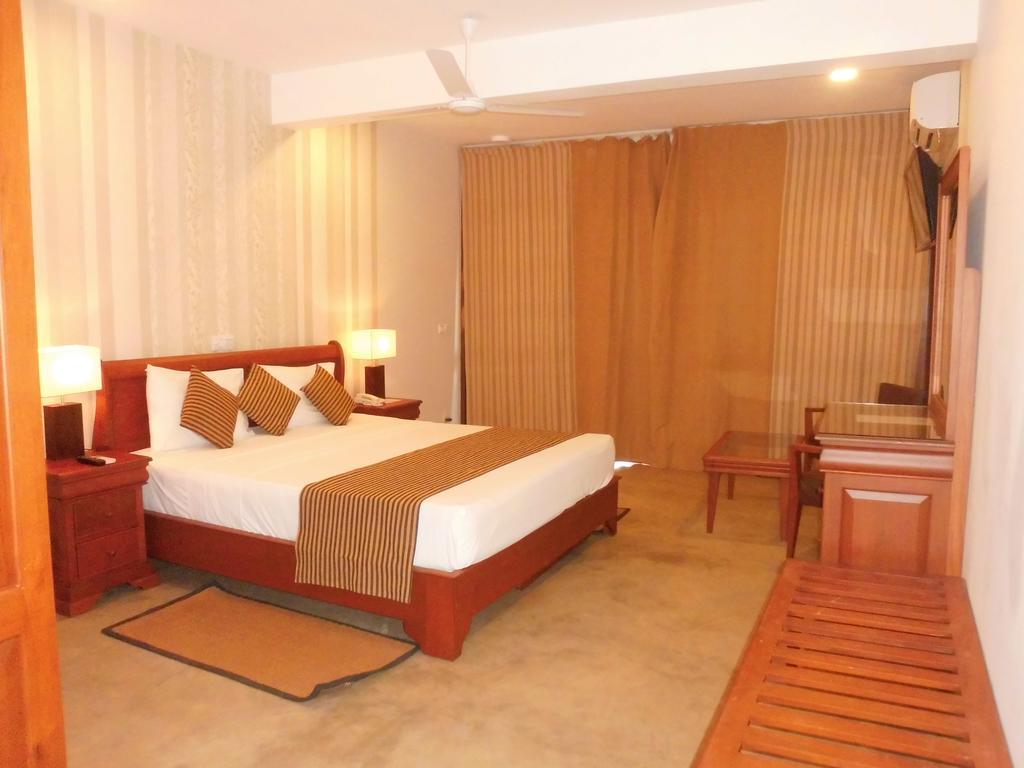Kamer met Queensize Bed en Uitzicht op Zee